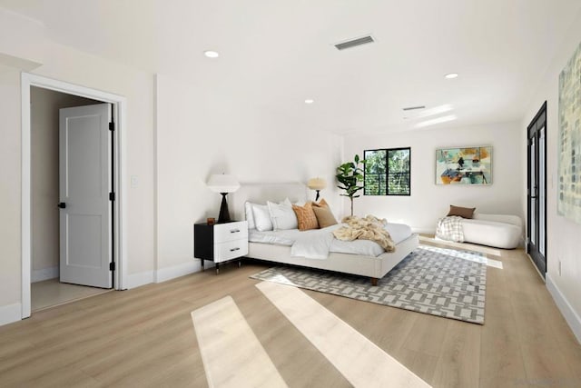 bedroom featuring light wood-type flooring