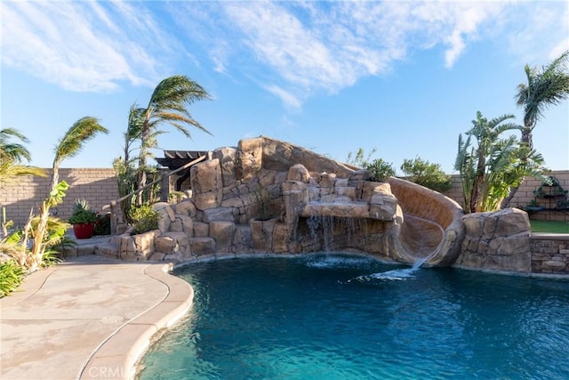 view of pool featuring pool water feature