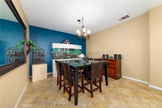 dining room with a chandelier