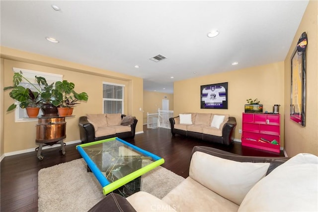 living room with dark hardwood / wood-style floors