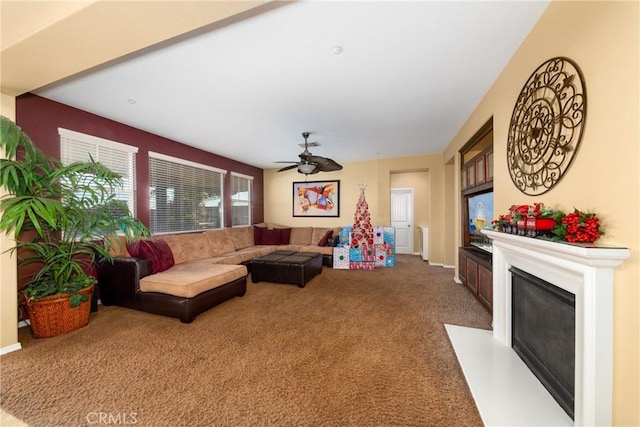 living room with carpet and ceiling fan