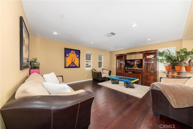 living room featuring pool table, dark hardwood / wood-style floors, and a wealth of natural light