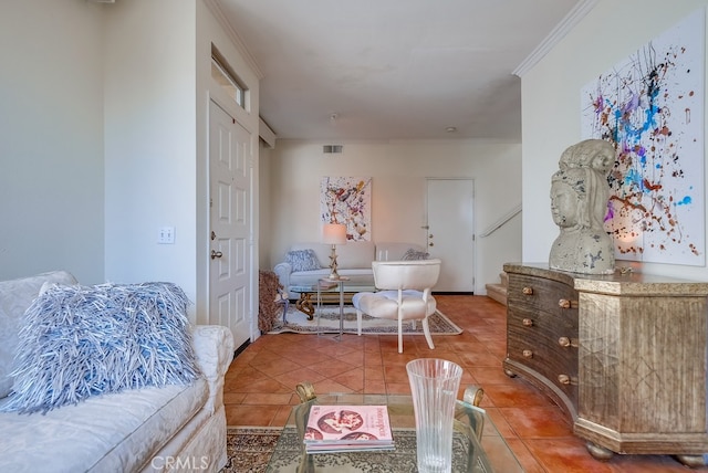 sitting room featuring crown molding and tile patterned floors