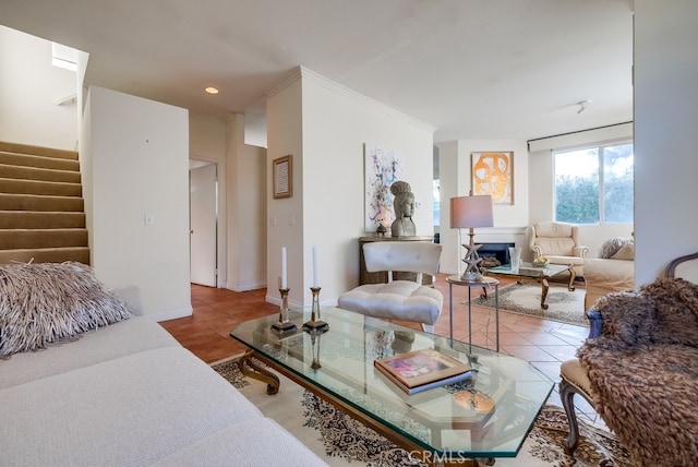 living room featuring tile patterned floors and ornamental molding