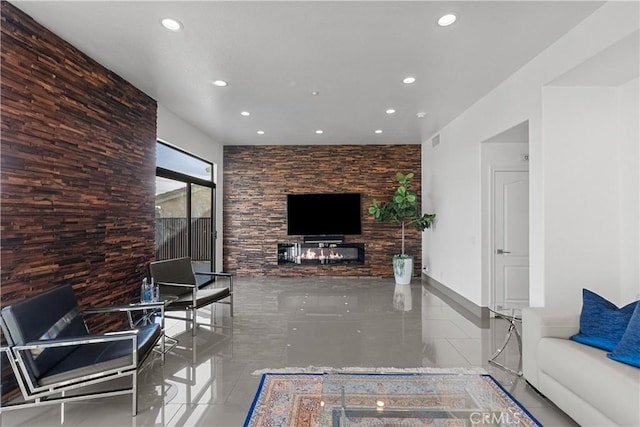 living area with recessed lighting and visible vents