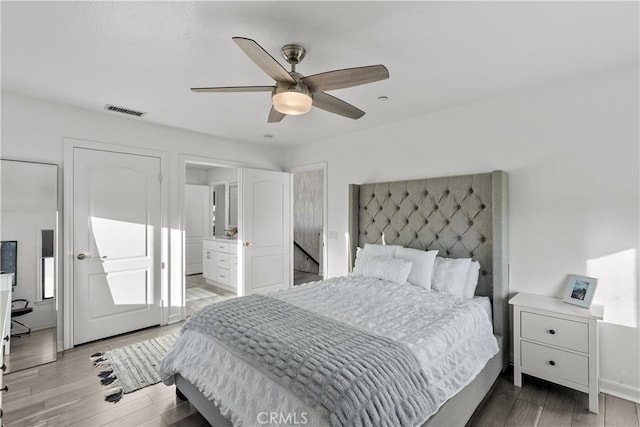 bedroom featuring light hardwood / wood-style flooring and ceiling fan