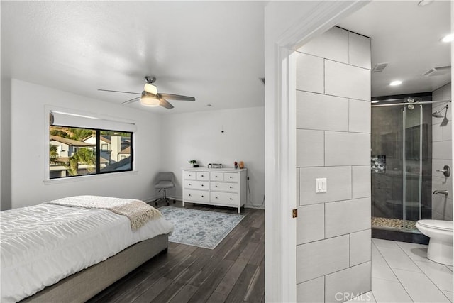 bedroom featuring ceiling fan and hardwood / wood-style floors