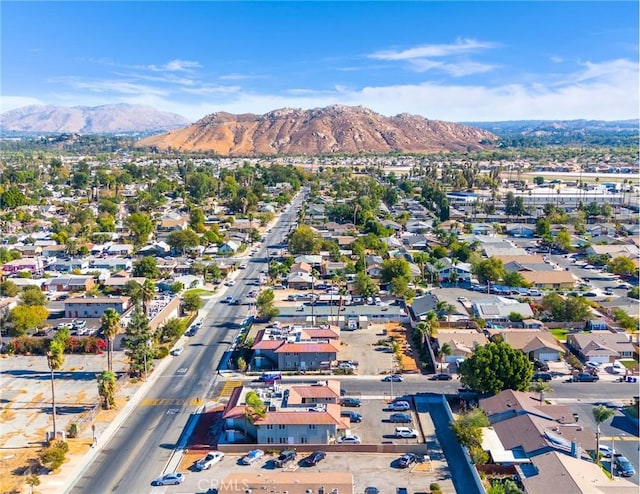 birds eye view of property with a mountain view