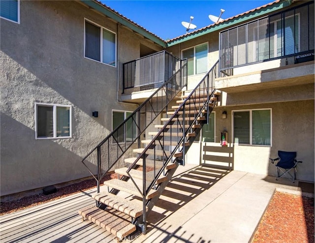 doorway to property with a patio area