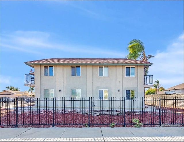 view of property exterior featuring a balcony