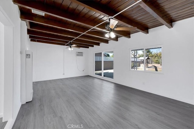 interior space featuring ceiling fan, hardwood / wood-style floors, beamed ceiling, and wood ceiling