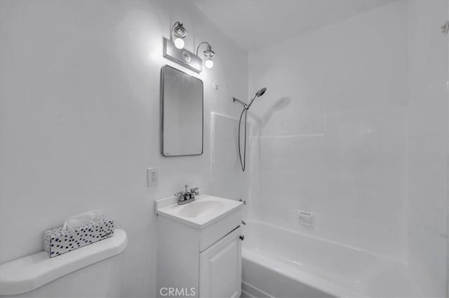 full bathroom featuring shower / bathing tub combination, vanity, and toilet