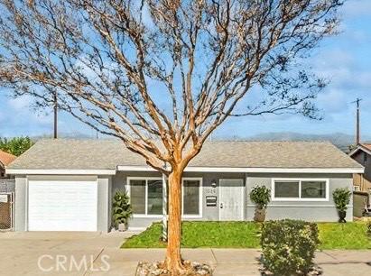 ranch-style home with a garage