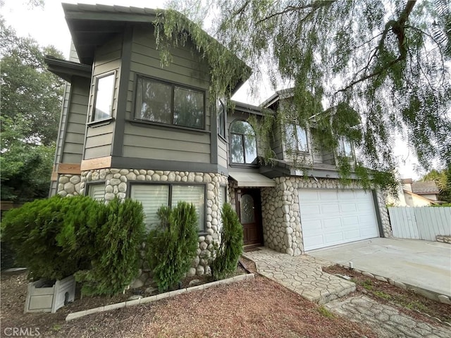 view of front of home with a garage