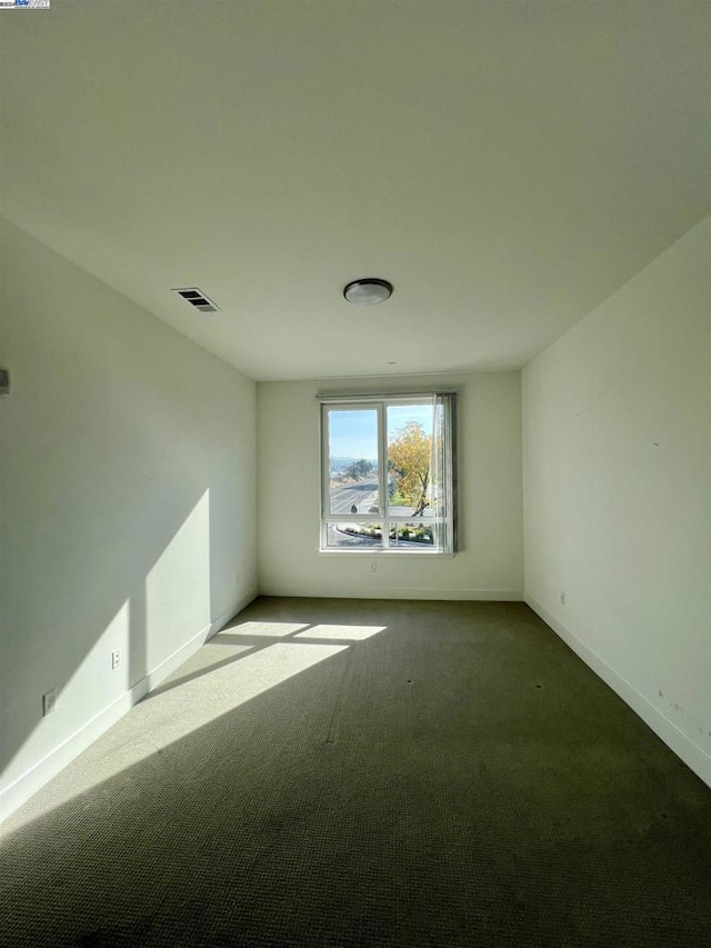 empty room with carpet floors