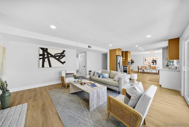 living room featuring light wood-type flooring