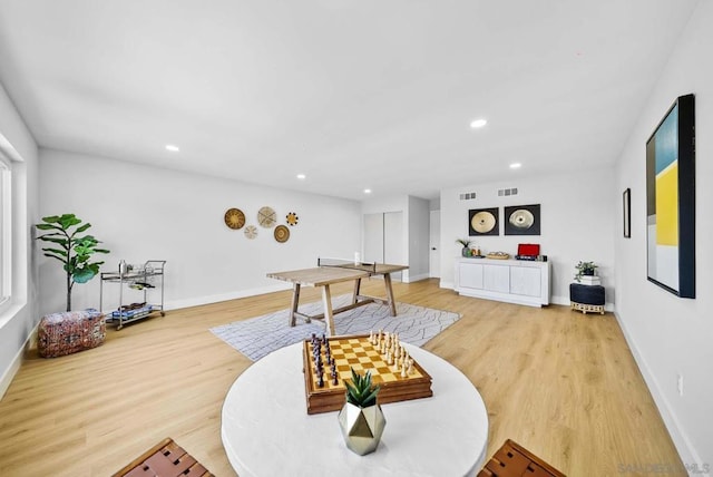 recreation room featuring hardwood / wood-style floors