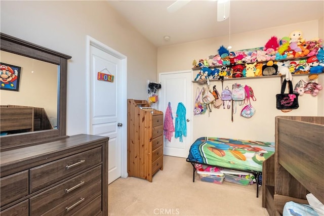 carpeted bedroom with ceiling fan