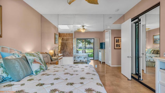 bedroom featuring ceiling fan and a closet