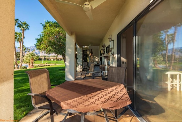 view of patio / terrace featuring ceiling fan