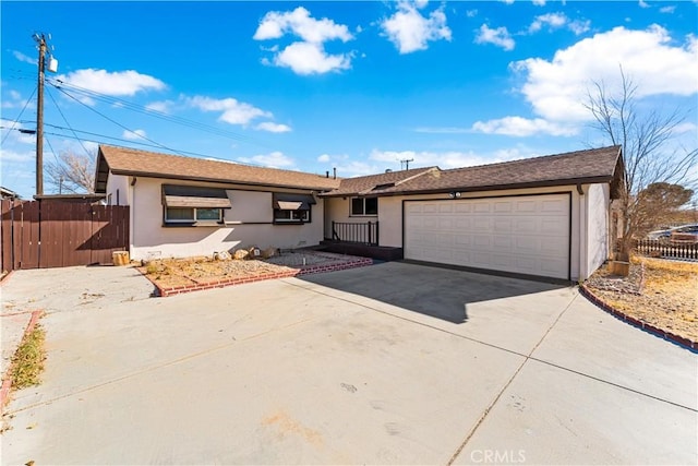 ranch-style house featuring a garage