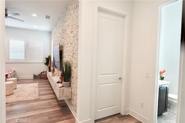 hallway featuring light wood-type flooring