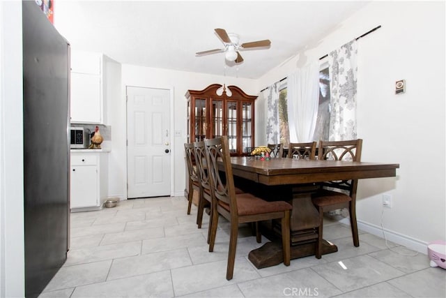 dining area with ceiling fan