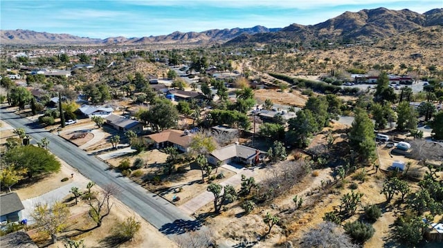 drone / aerial view featuring a mountain view