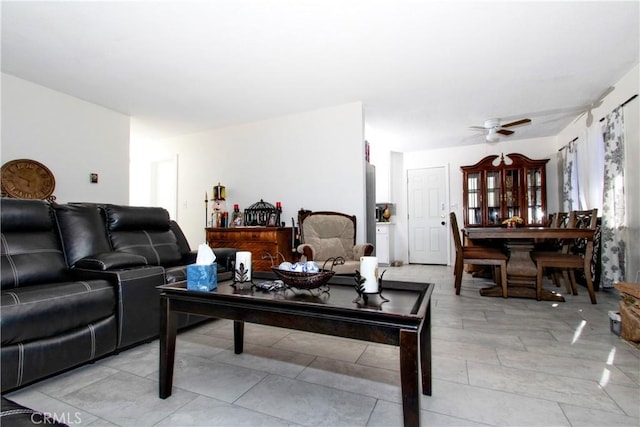 living room with ceiling fan