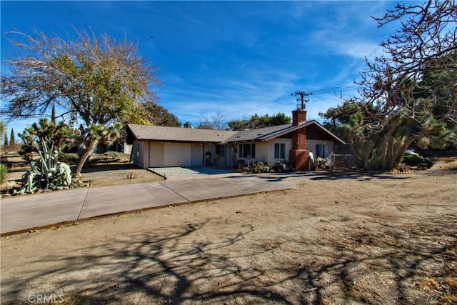 single story home with a garage