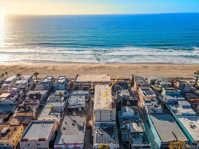 aerial view with a beach view and a water view