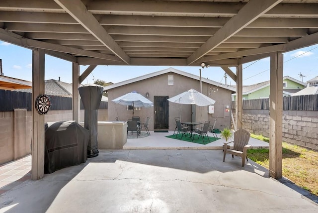 1417 W Gage Ave, Los Angeles, CA 90047 - fenced backyard with a patio, outdoor dining area, and grilling area