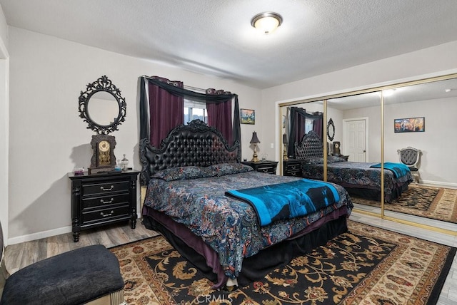 1417 W Gage Ave, Los Angeles, CA 90047 - bedroom featuring wood finished floors and a closet