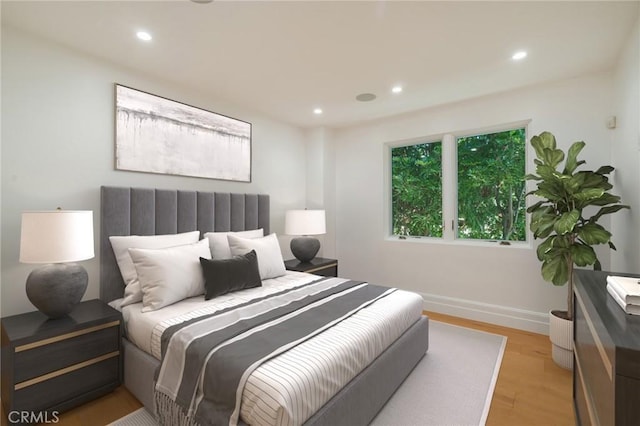 bedroom featuring light hardwood / wood-style flooring