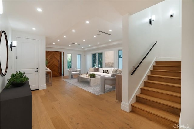 living room with light hardwood / wood-style flooring