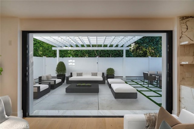 interior space with a pergola and an outdoor hangout area