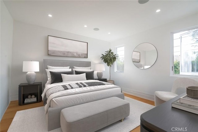 bedroom with light wood-type flooring