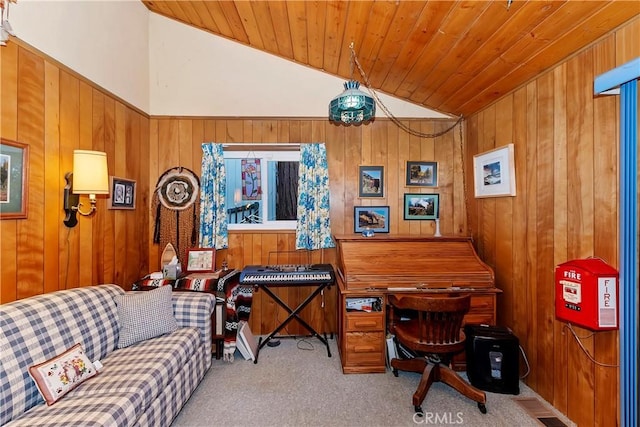 carpeted office space featuring wood walls, wooden ceiling, and vaulted ceiling