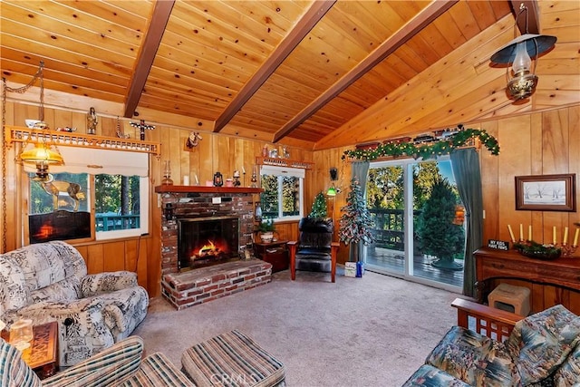 carpeted living room featuring wooden walls, wooden ceiling, a fireplace, and a wealth of natural light