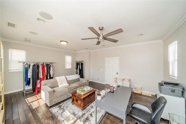 living room with dark hardwood / wood-style flooring, ceiling fan, and crown molding