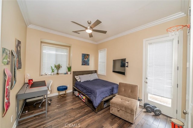 bedroom with dark hardwood / wood-style floors, ceiling fan, and crown molding