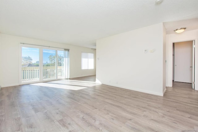 empty room featuring light hardwood / wood-style floors