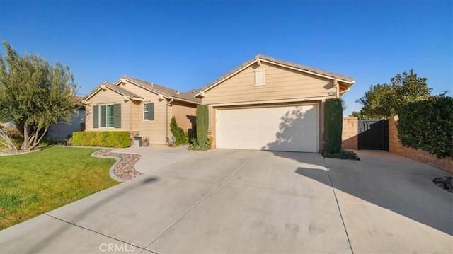 ranch-style house with a front yard and a garage