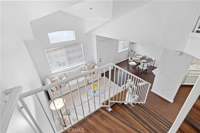 stairway featuring hardwood / wood-style flooring