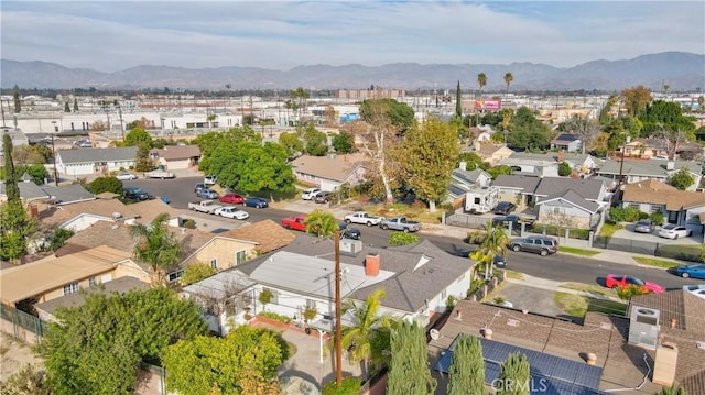drone / aerial view with a residential view and a mountain view
