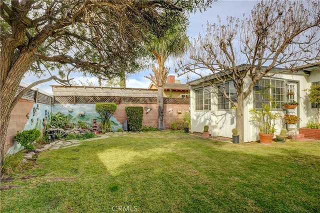 view of yard with fence