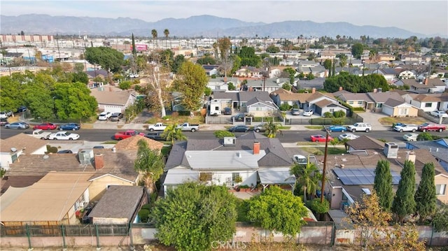drone / aerial view with a residential view and a mountain view