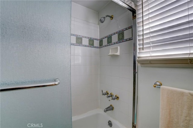 bathroom featuring  shower combination
