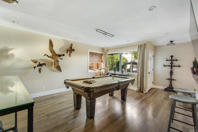 game room featuring billiards and hardwood / wood-style floors