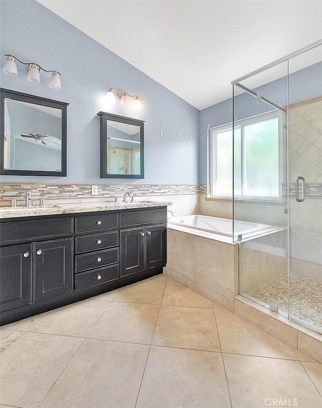 bathroom featuring vanity, tile patterned floors, and independent shower and bath